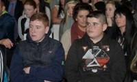 The audience look on in excited anticipation