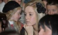 The audience look on in excited anticipation